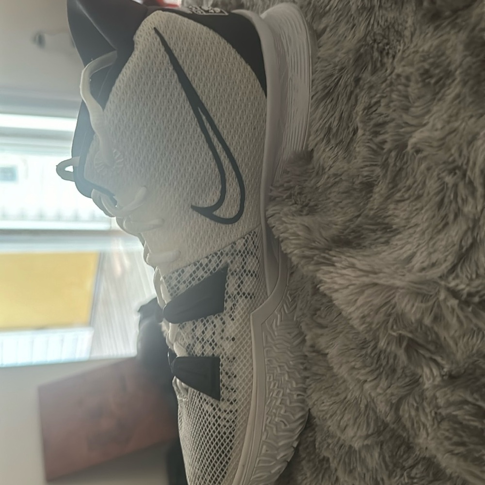US size 8.5 women’s Nike Kyrie basketball shoes. Worn once and were too big.